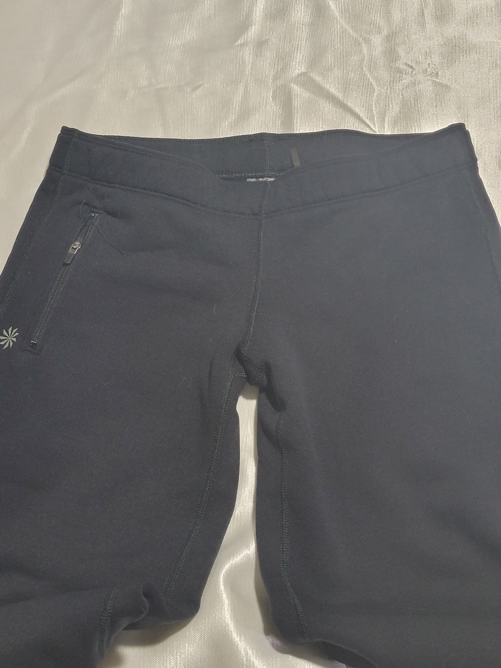 Athleta Black Performance Low Rise Sweats with Silver Logo